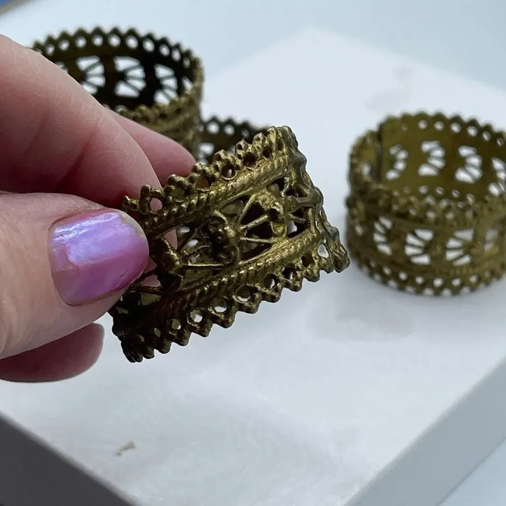 Set of 5 vintage ornate brass napkin ring holders.